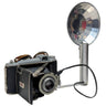Vintage camera with a flash unit