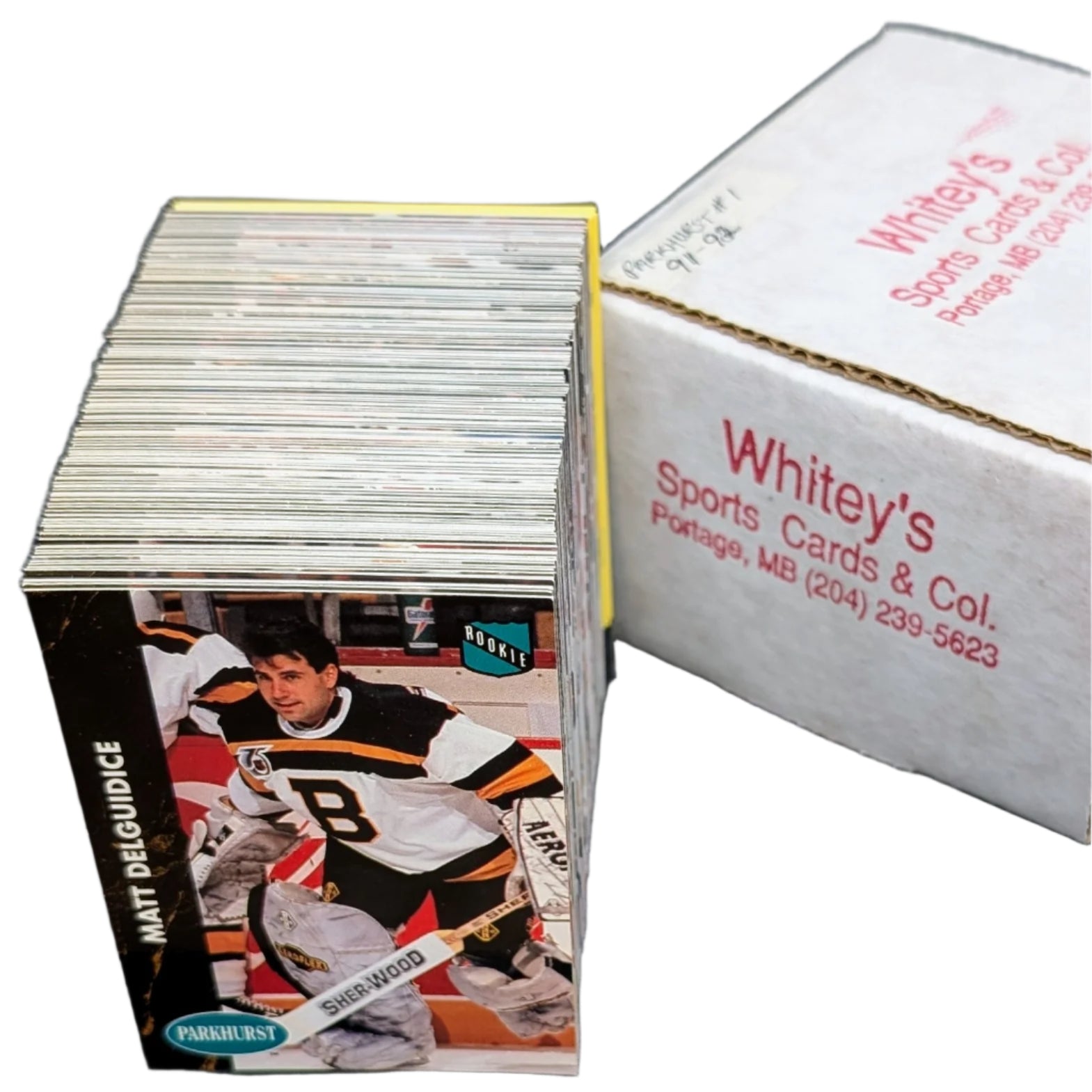 Stack of 1991-92 Parkhurst NHL Hockey trading cards with a box labeled 'Whitey's Sports Cards & Co.'