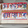 Collection of hockey trading cards in a box