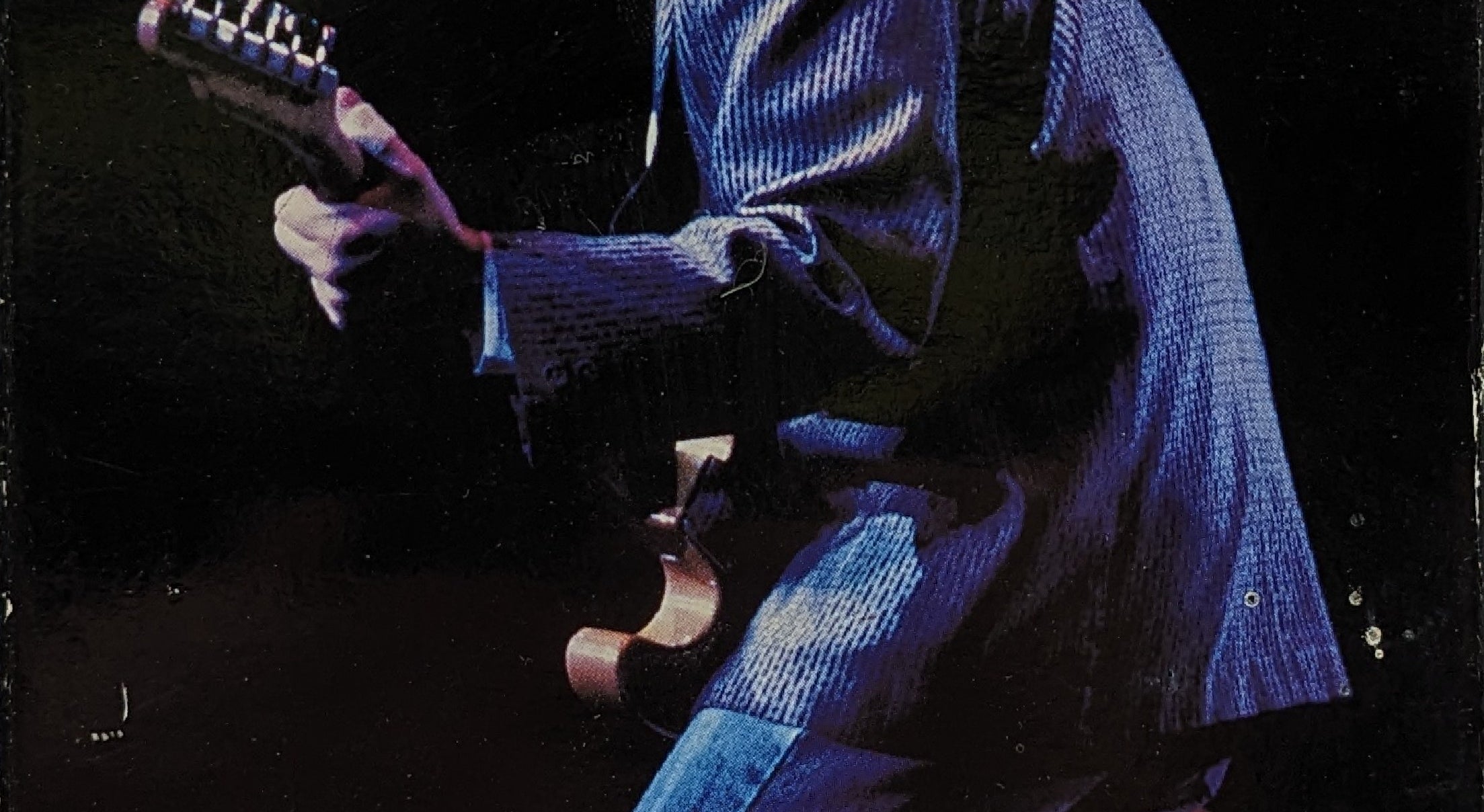 The image features the cover of the VHS titled "Billy Joel Live From Leningrad USSR." The cover depicts a black and white photo of Billy Joel in mid-performance attire, singing and playing a guitar.