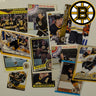 Collection of Boston Bruins hockey trading cards on a white background