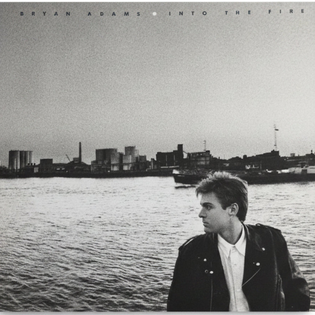 Album cover with a person by a waterfront with a city skyline in the background
