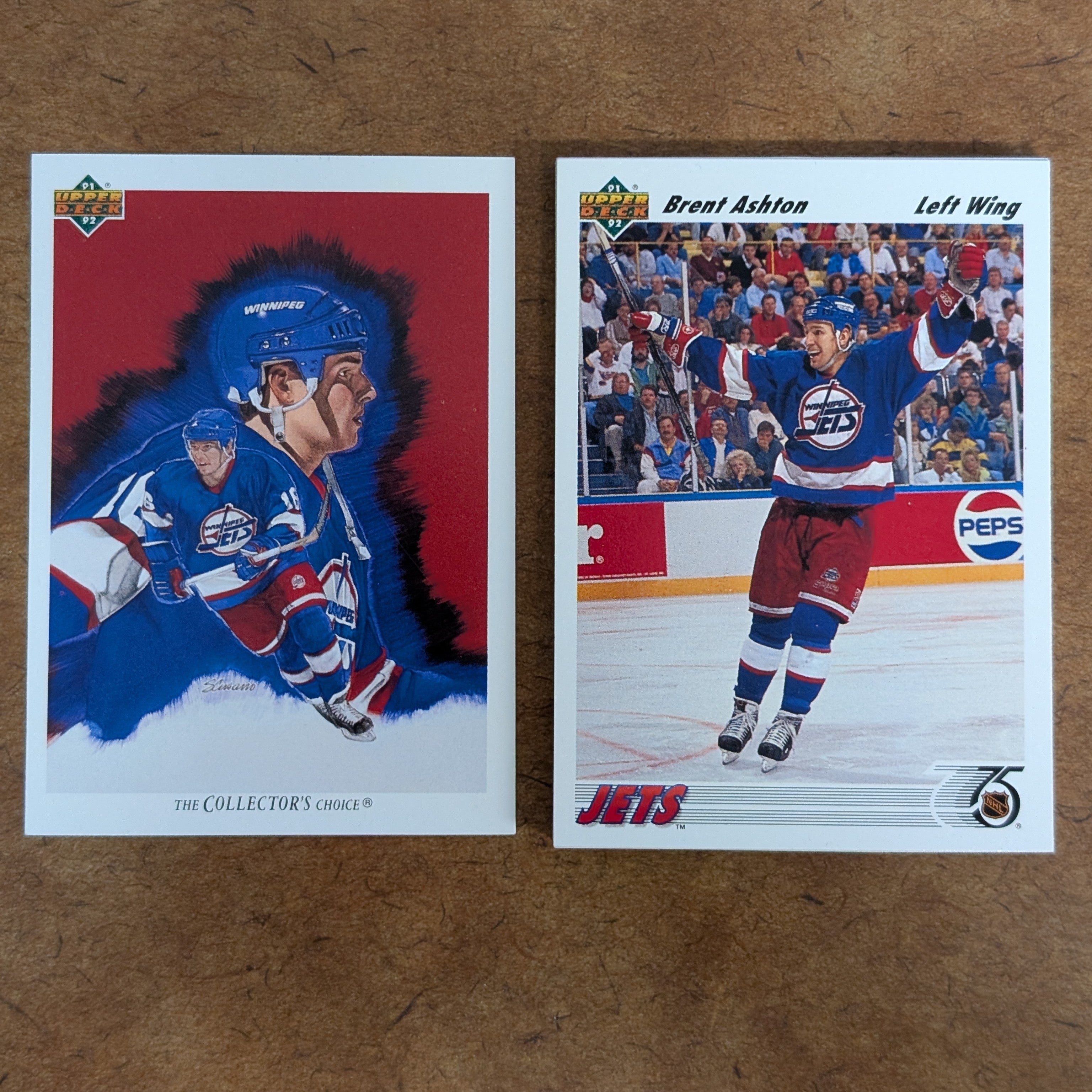 Two vintage hockey trading cards displayed side by side on a brown textured surface. The left card is a 1994 Upper Deck 'The Collector's Choice' card featuring an illustrated portrait of Ed Olczyk.