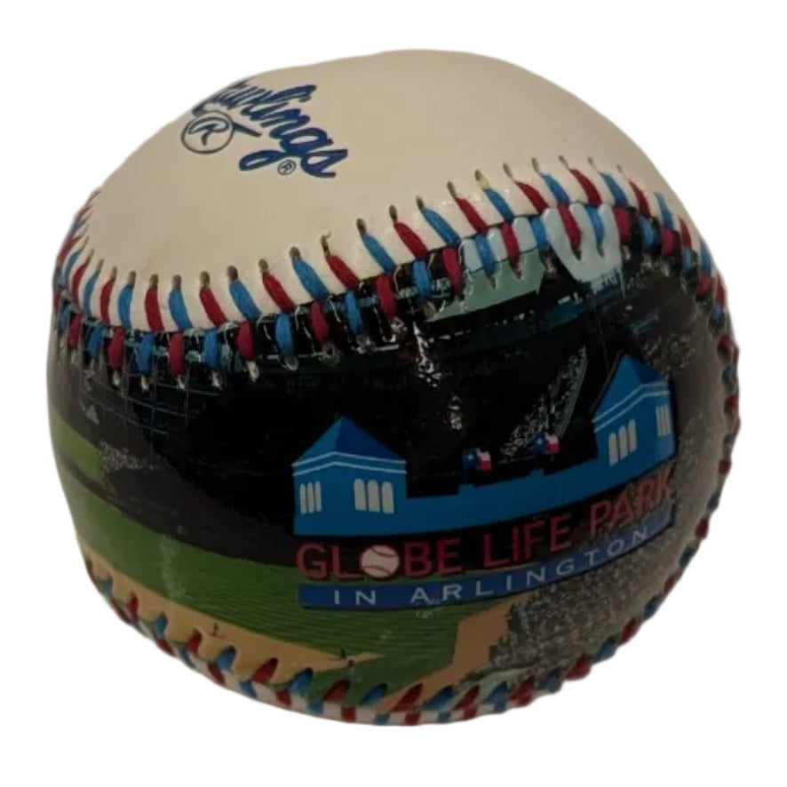 Baseball with a colorful design on a white surface