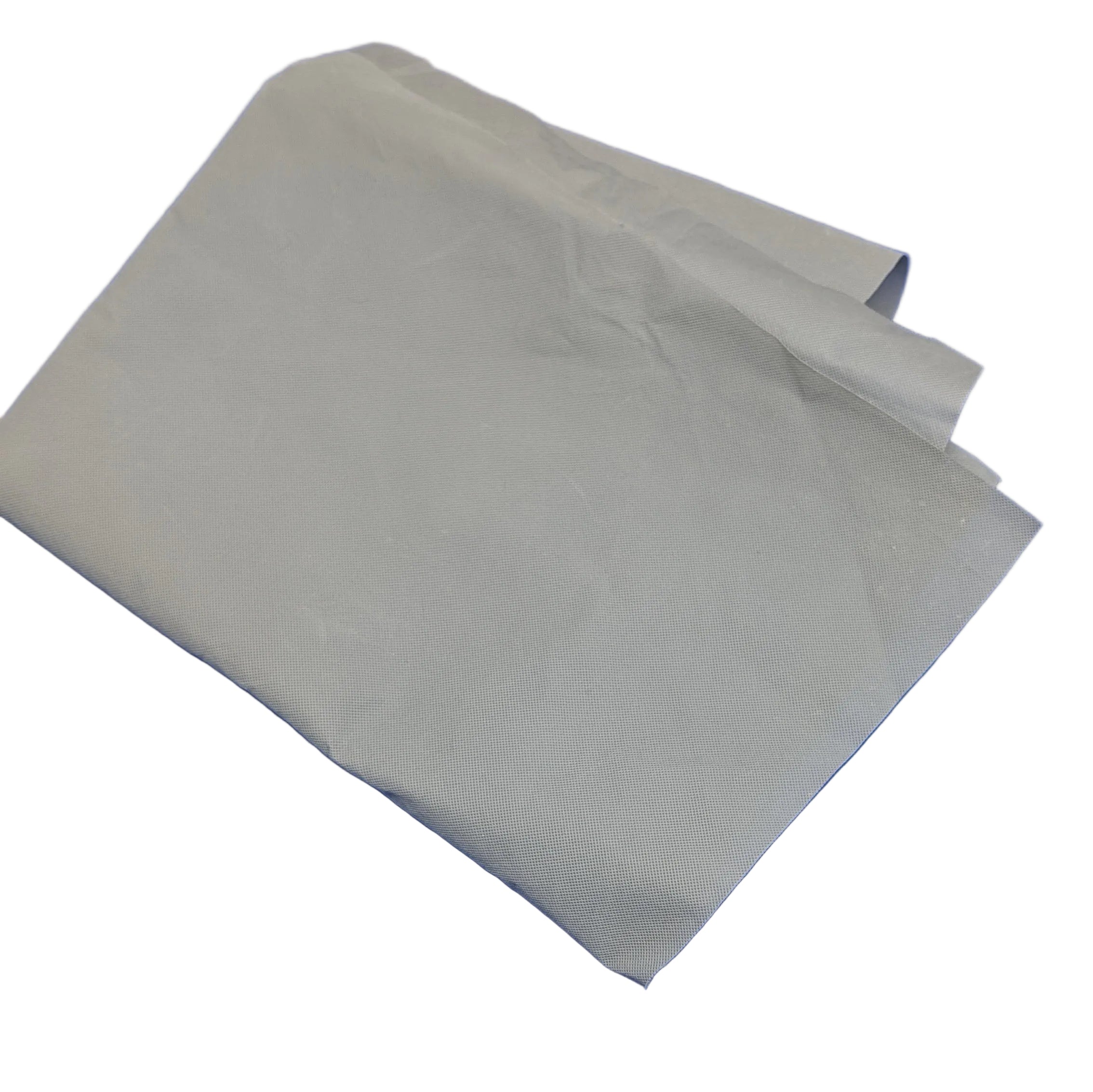 A folded piece of light gray fabric or paper resting on a solid white background.