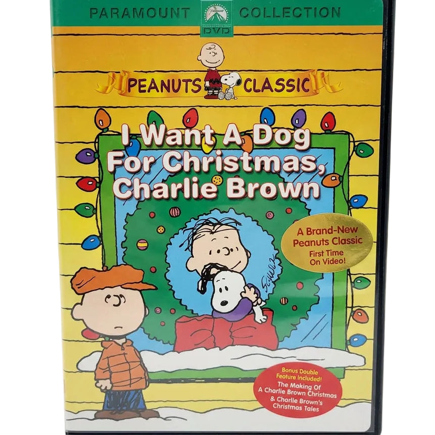 DVD cover for 'I Want A Dog For Christmas, Charlie Brown' from the Paramount Collection Peanuts Classic series, featuring Charlie Brown, Snoopy, and a snowy holiday scene.