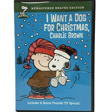 I Want a Dog for Christmas, Charlie Brown (Remastered Deluxe Edition) DVD cover featuring Snoopy and Charlie Brown in the snow, with the Peanuts logo in the top left corner.