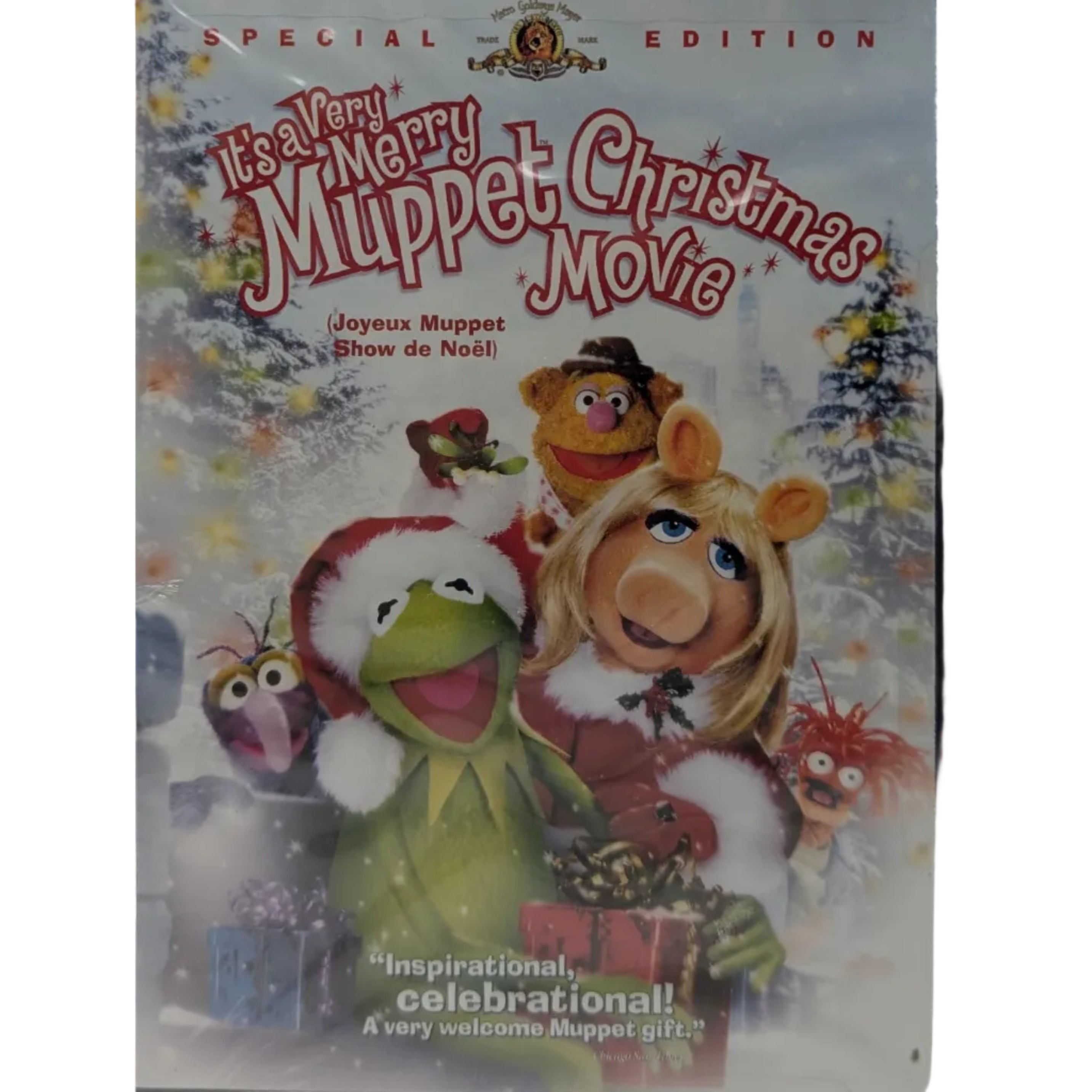 DVD cover for 'It's a Very Merry Muppet Christmas Movie' Special Edition, featuring Kermit the Frog, Miss Piggy, Fozzie Bear, Gonzo, and Rigby in a snowy Christmas scene.