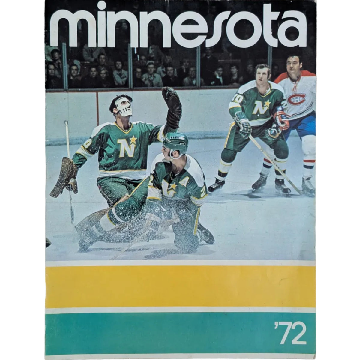 A vintage Minnesota hockey magazine or program from 1972 lying flat on a white surface. The cover features a photo of hockey players in action, with 'minnesota' printed in large white letters at the top and a teal and yellow stripe at the bottom with the year '72'.
