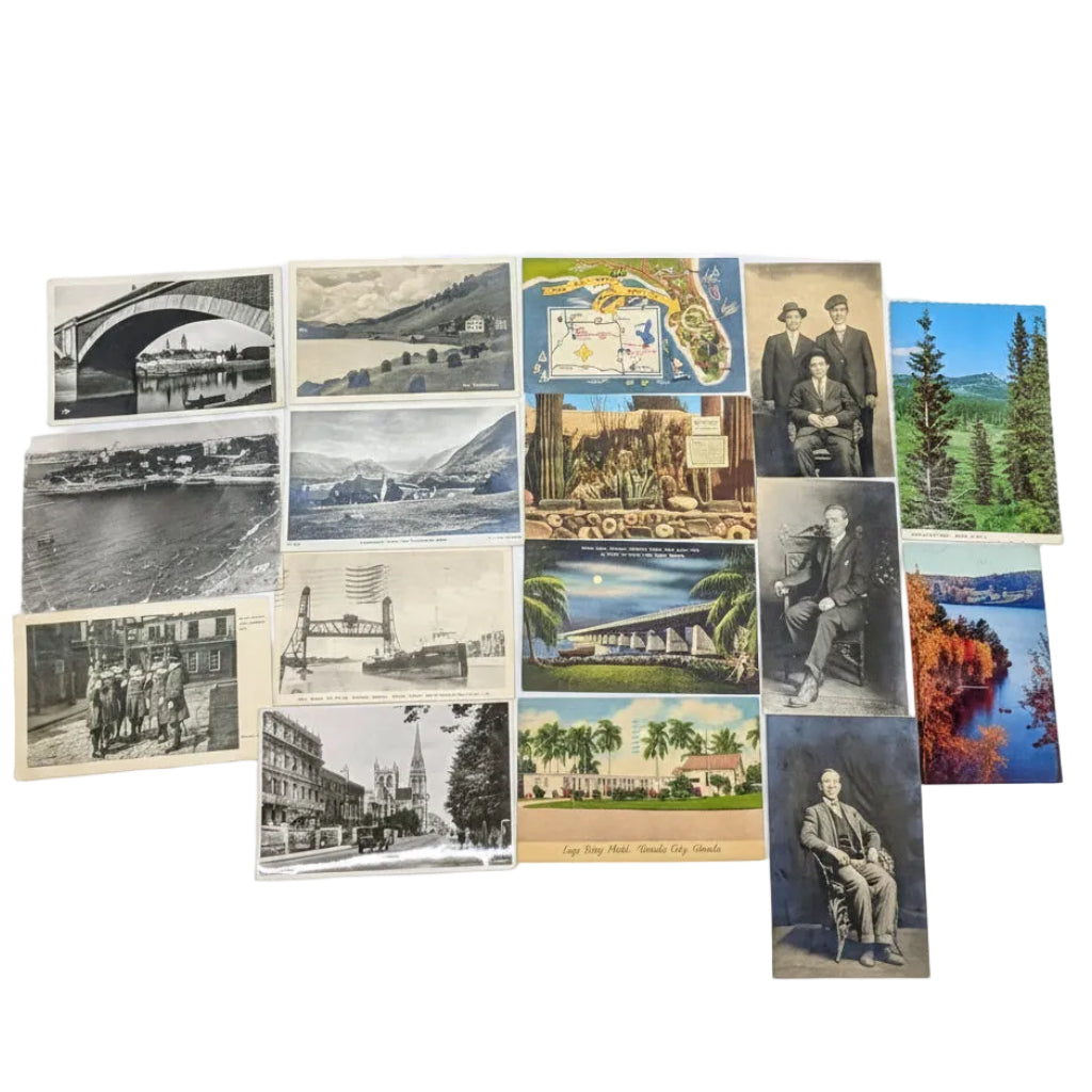 Collection of vintage postcards on a white surface