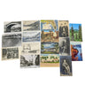 Collection of vintage postcards on a white surface