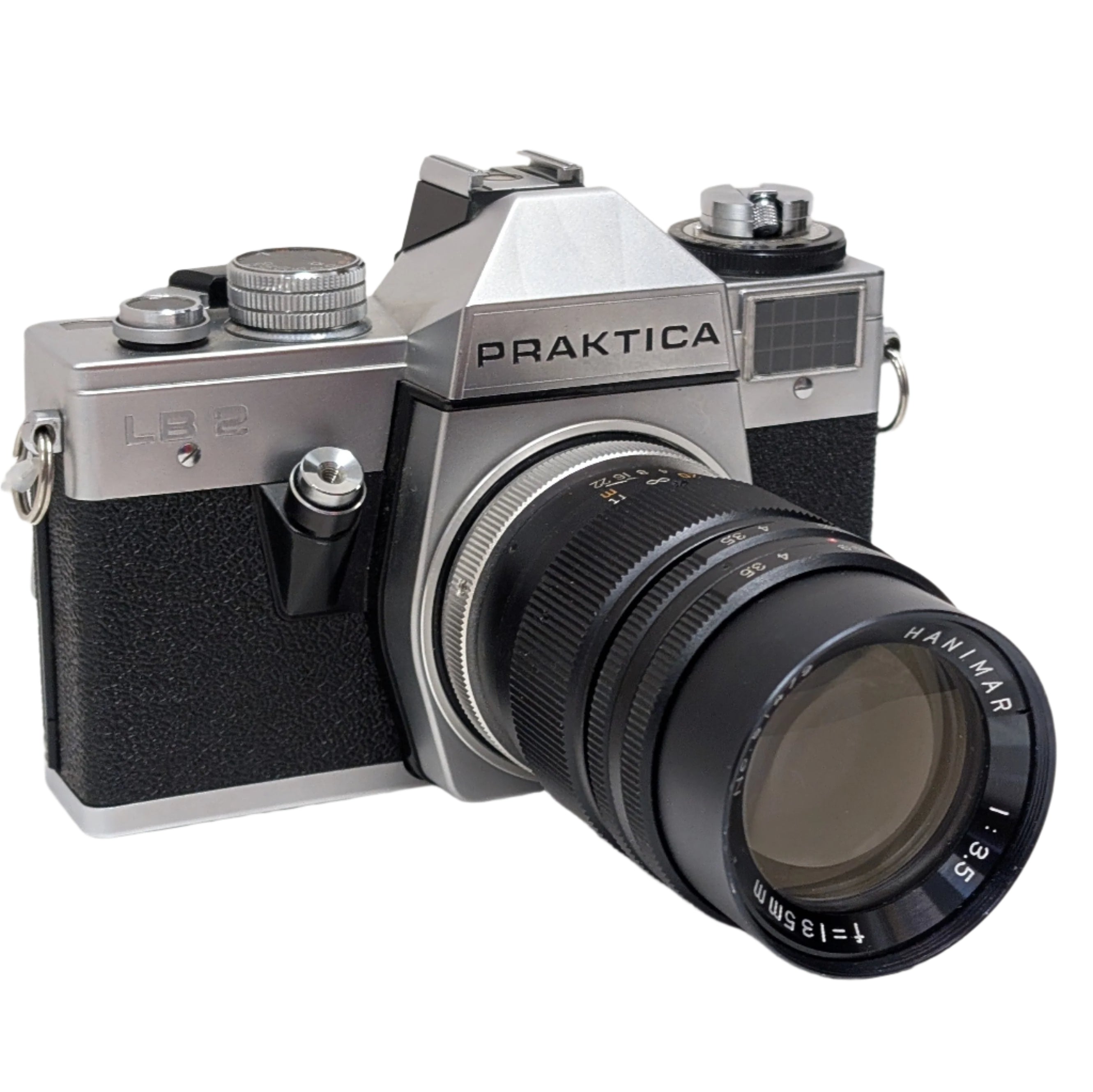 Vintage Praktica camera with black lens on a white background