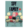Cover of 'Spy x Family' volume 2 with a character sitting on a colorful bench.