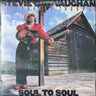 Album cover featuring a person playing guitar in front of a wooden cabin with 'Stevie Ray Vaughan and Double Trouble Soul to Soul' text.