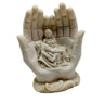 Decorative sculpture of a hand holding a religious scene with 'Roma' at the base on a white background