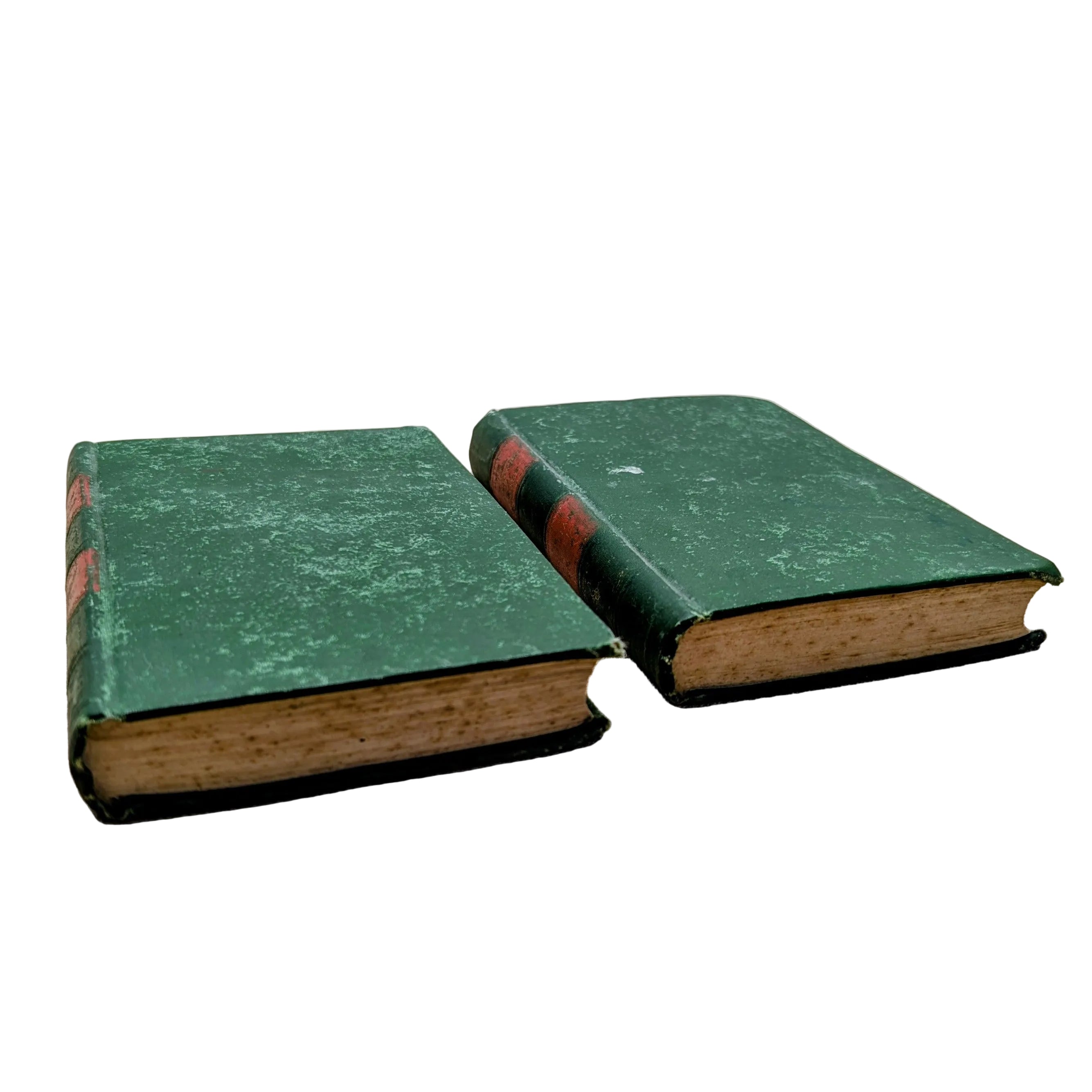 Two green books with brown spines on a white surface