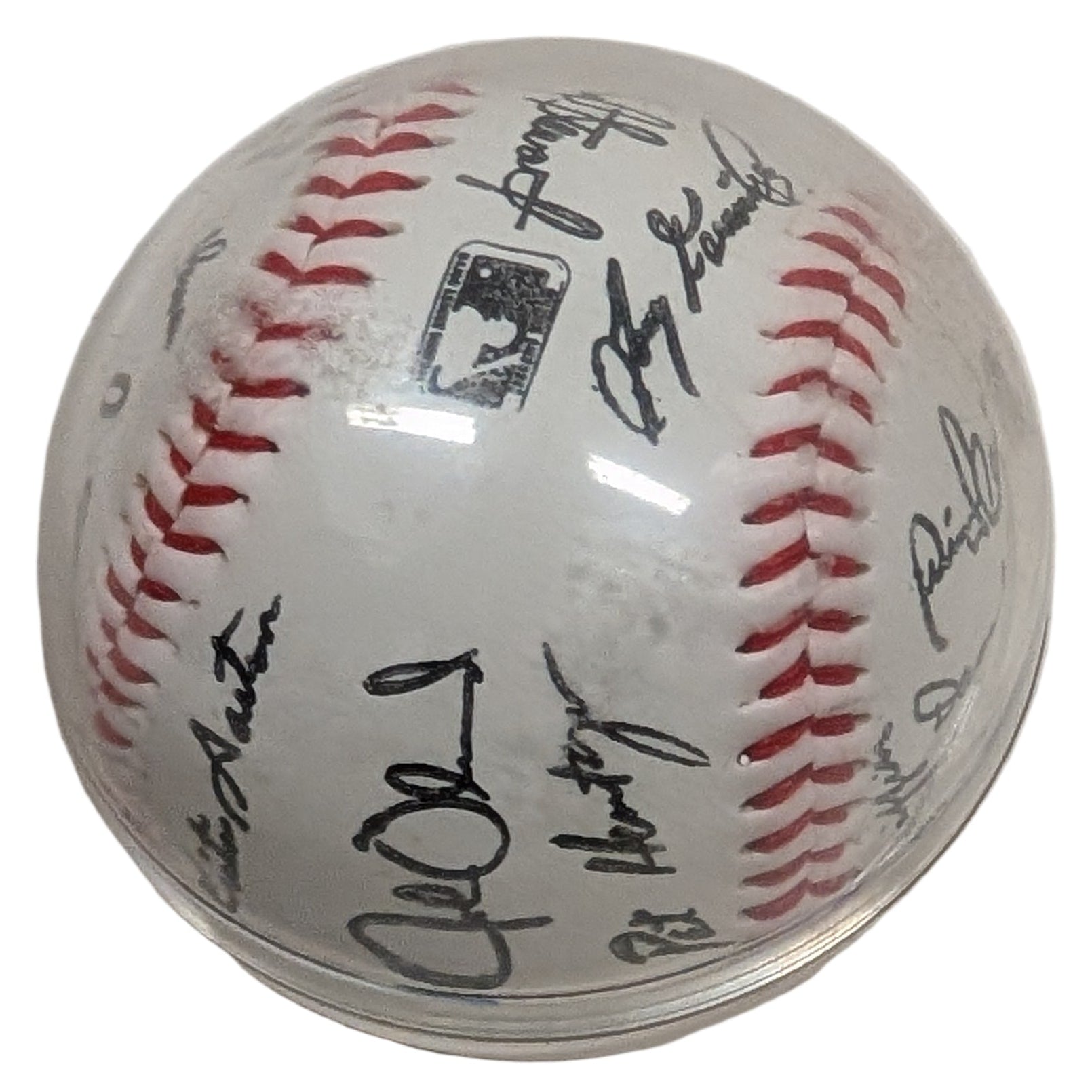 Baseball with autographs on a white background