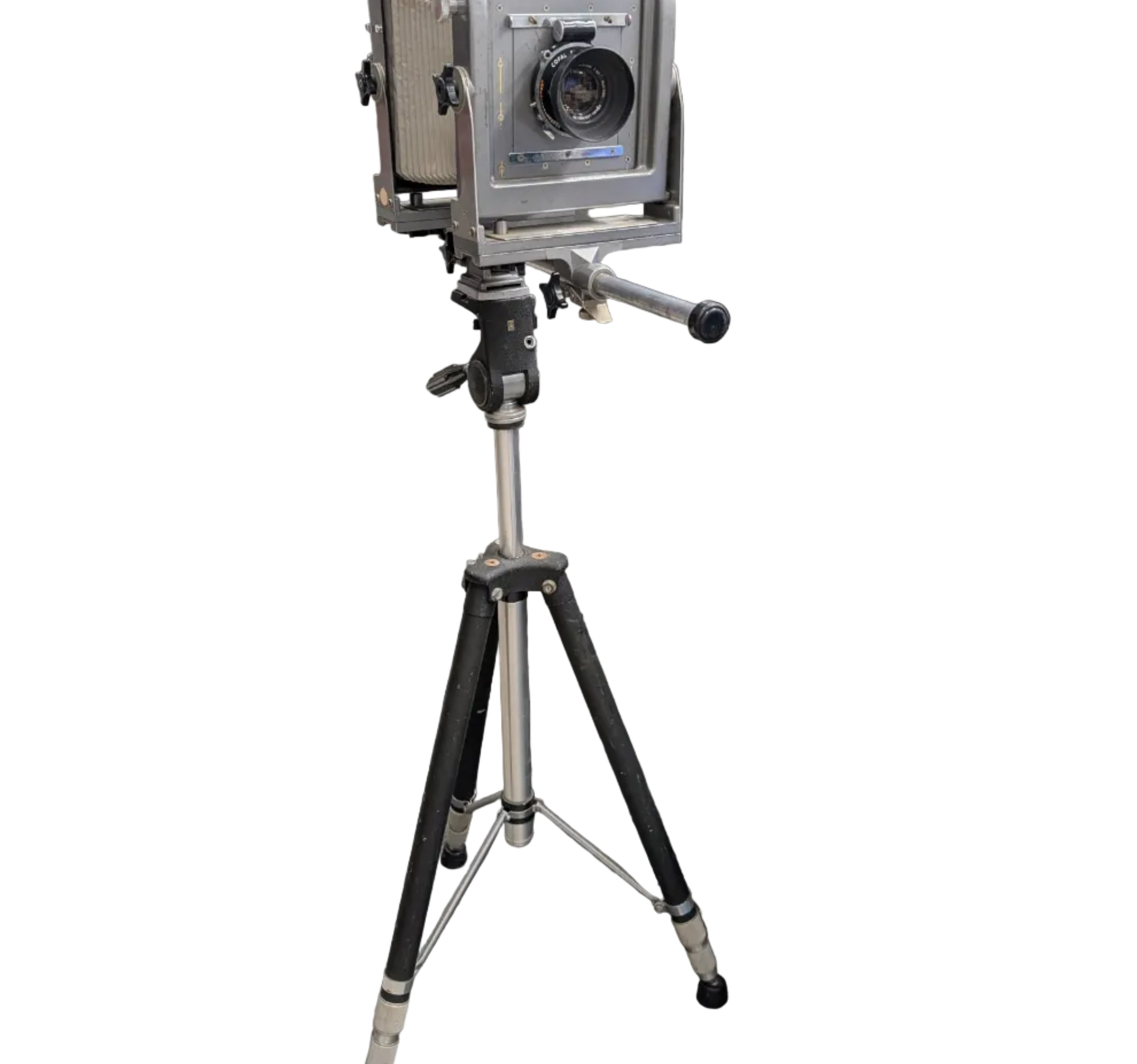 A vintage medium format camera, mounted on a tripod