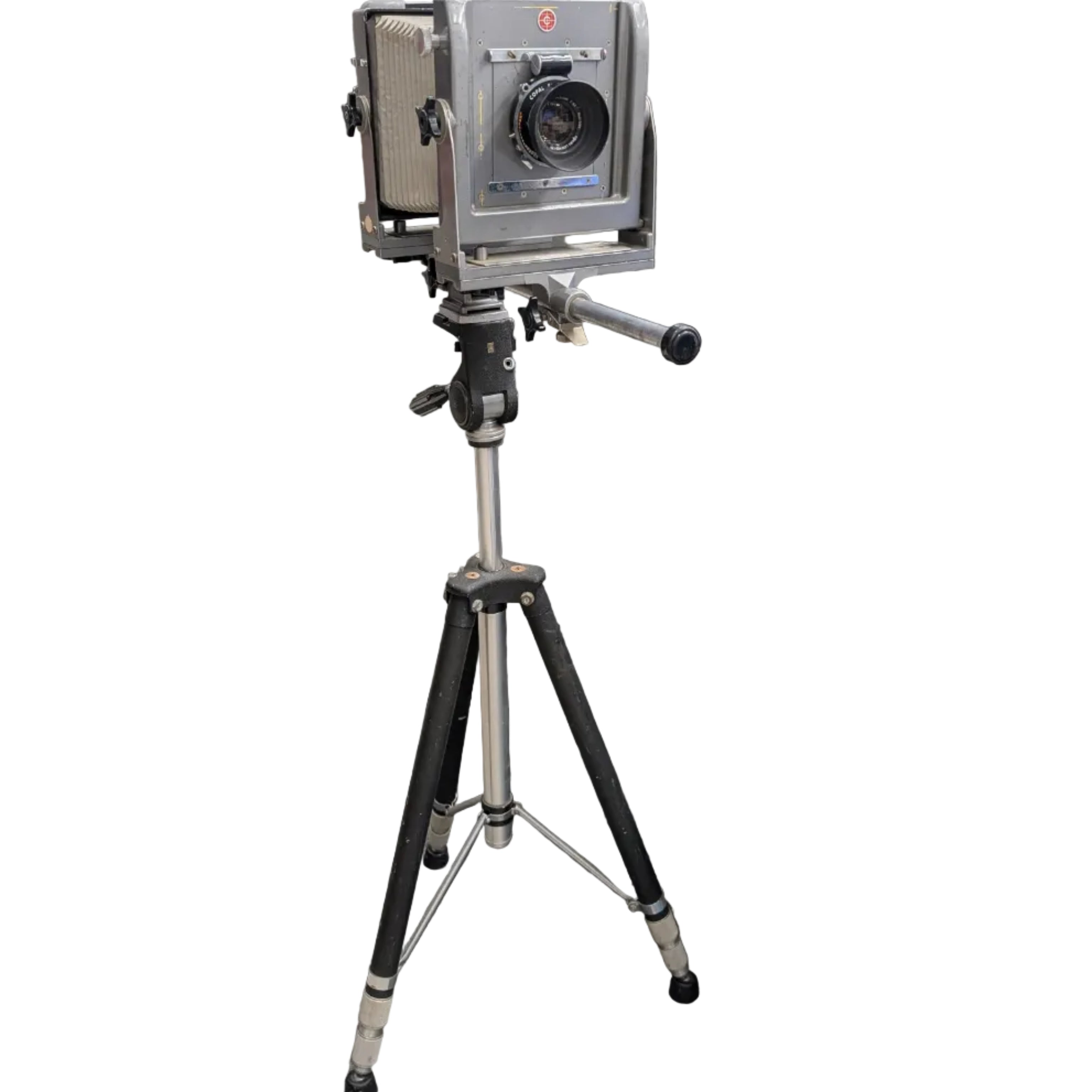 A vintage medium format camera, mounted on a tripod