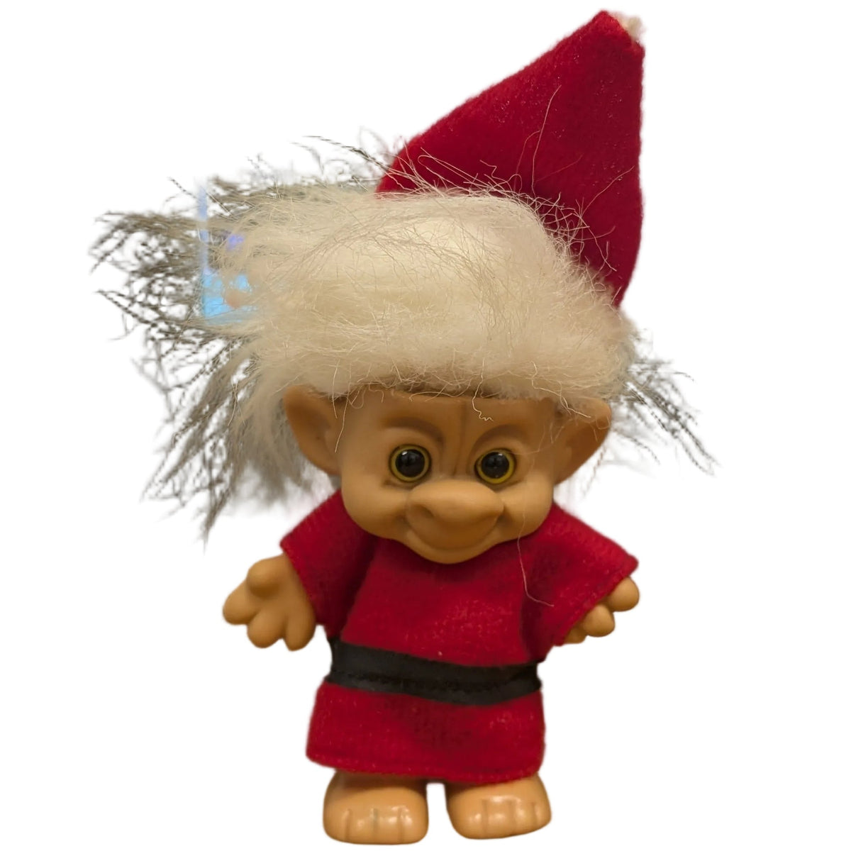 A small Santa Claus troll figurine with a red hat and red outfit standing on a white background.