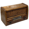 Vintage wooden radio on a white surface