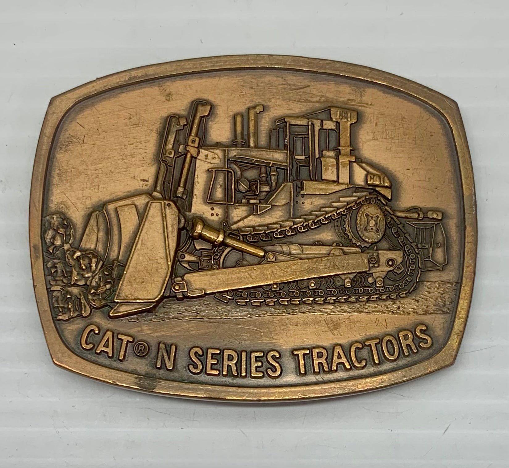 Tractor sales belt buckle