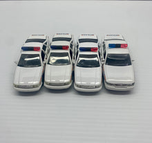 Load image into Gallery viewer, 1993 Road Champs RCMP Cars (set of 4)
