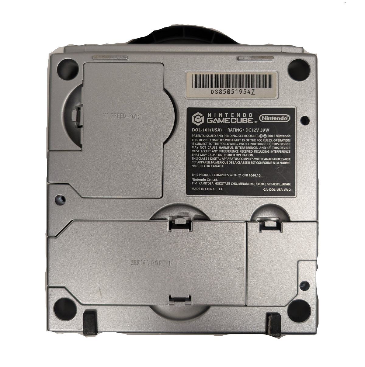 the bottom of a platinum gamecube