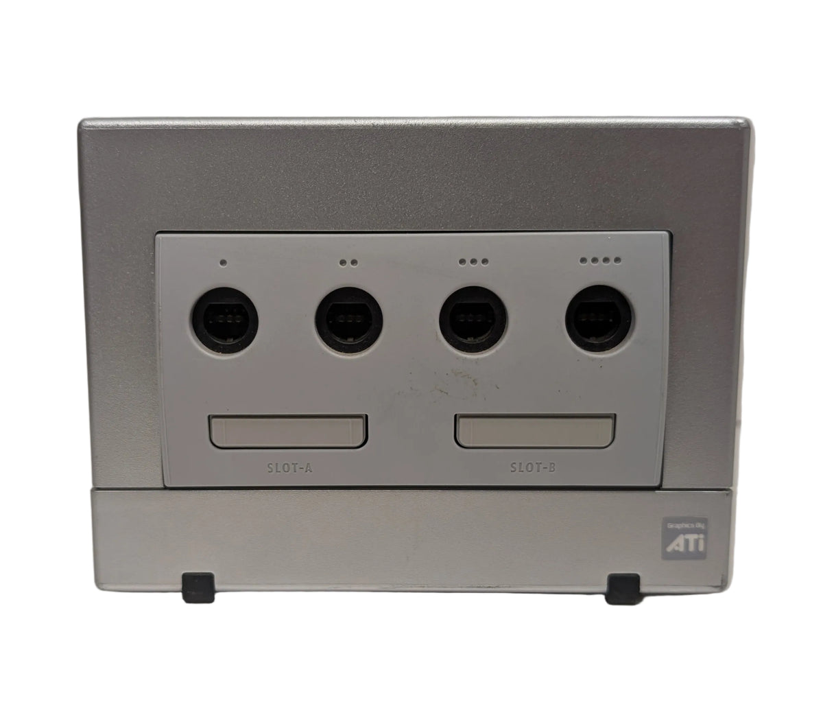 the front of a platinum gamecube